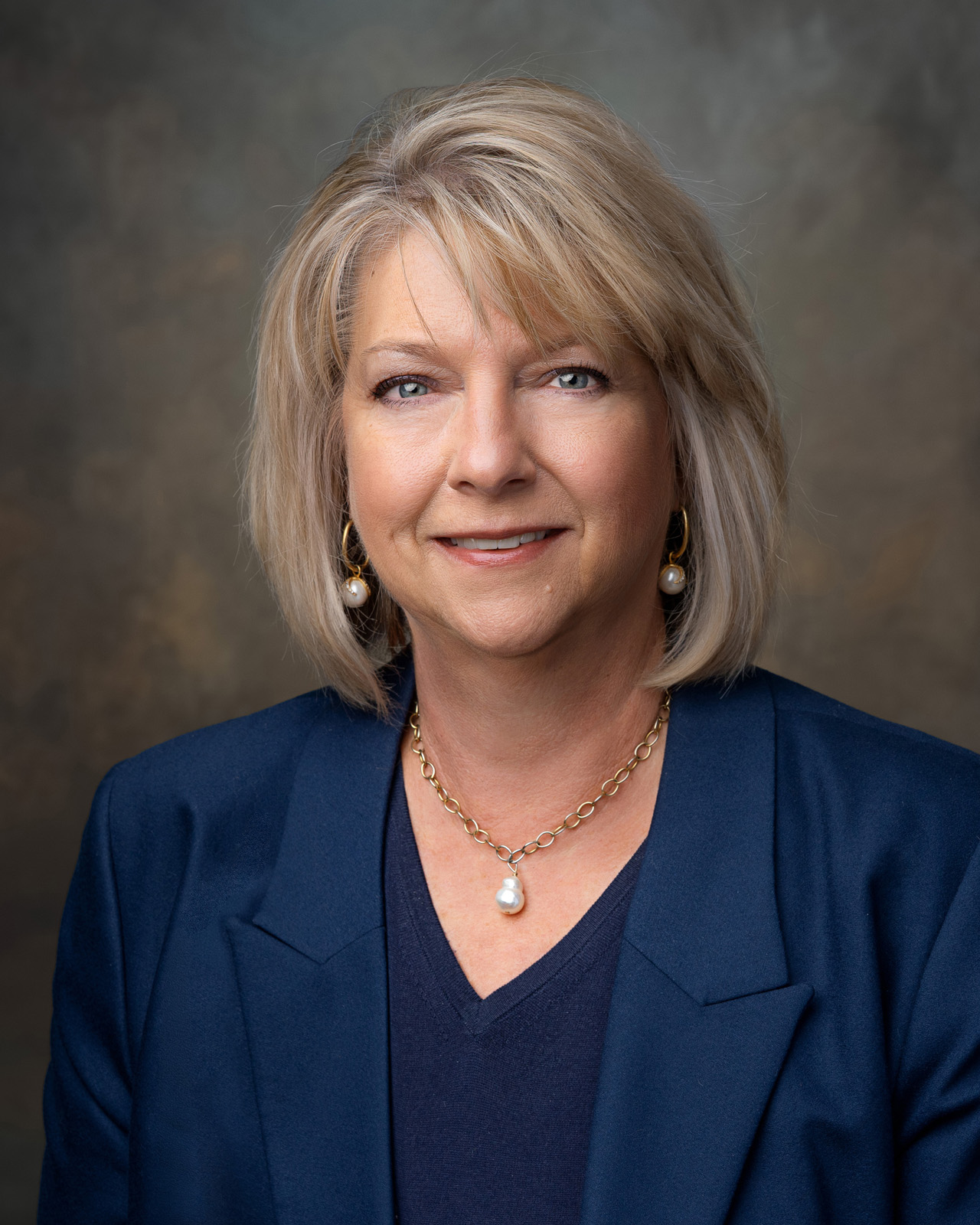 Professional headshot in Greenwood SC studio with soft light and simple background